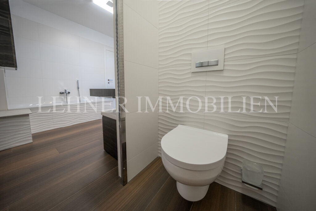 Lehner Immobilien Modernes Eckreihenhaus mit Haus-Charakter und Pool in Feldkirchen bei Graz